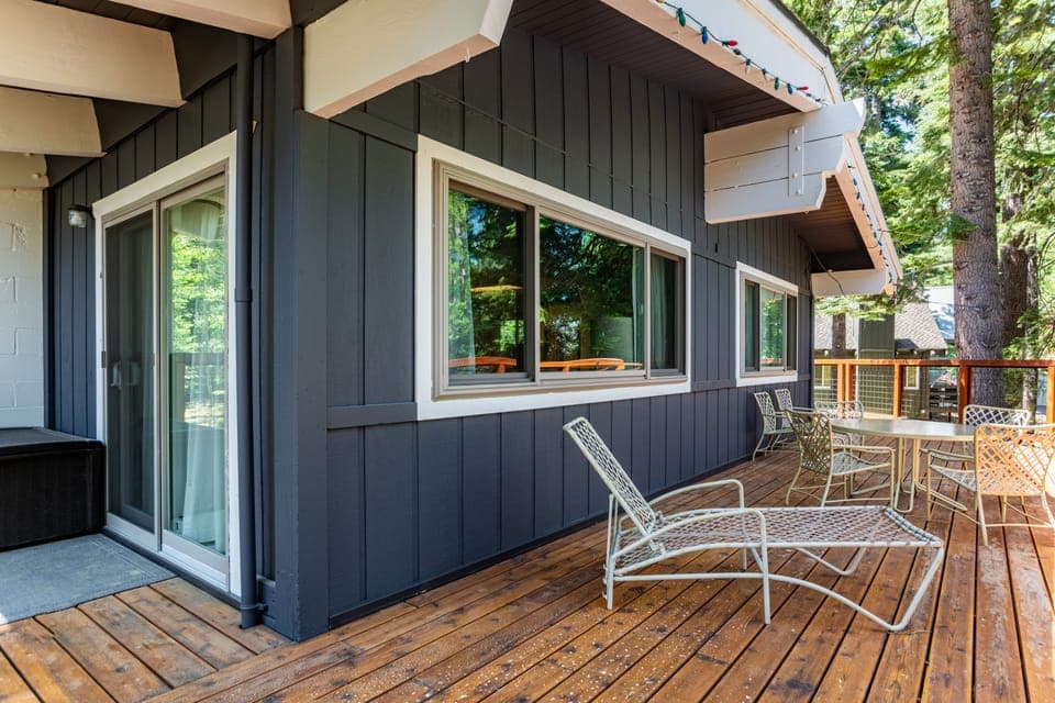 Sunny deck with loungers and al fresco dining.
