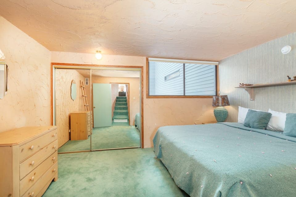 Primary bedroom features a king bed.