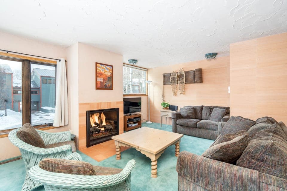 Cosy living area with a fireplace to keep you warm.