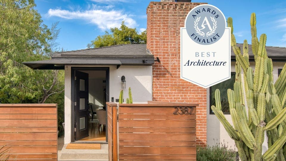 Spacious backyard features a propane firepit.