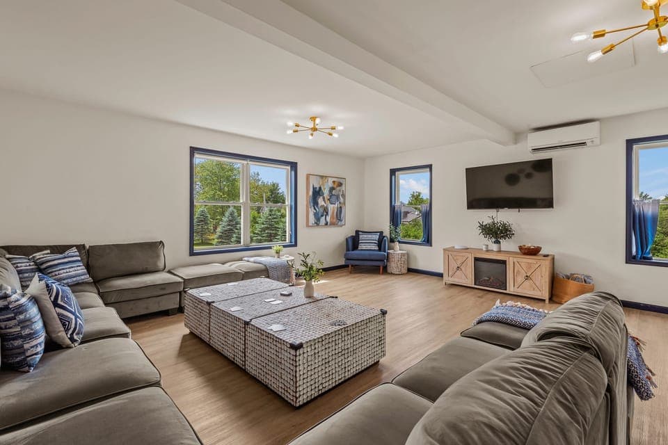 Spacious living area features a large sectional.