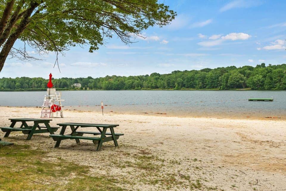 Located near a beautiful community beach.