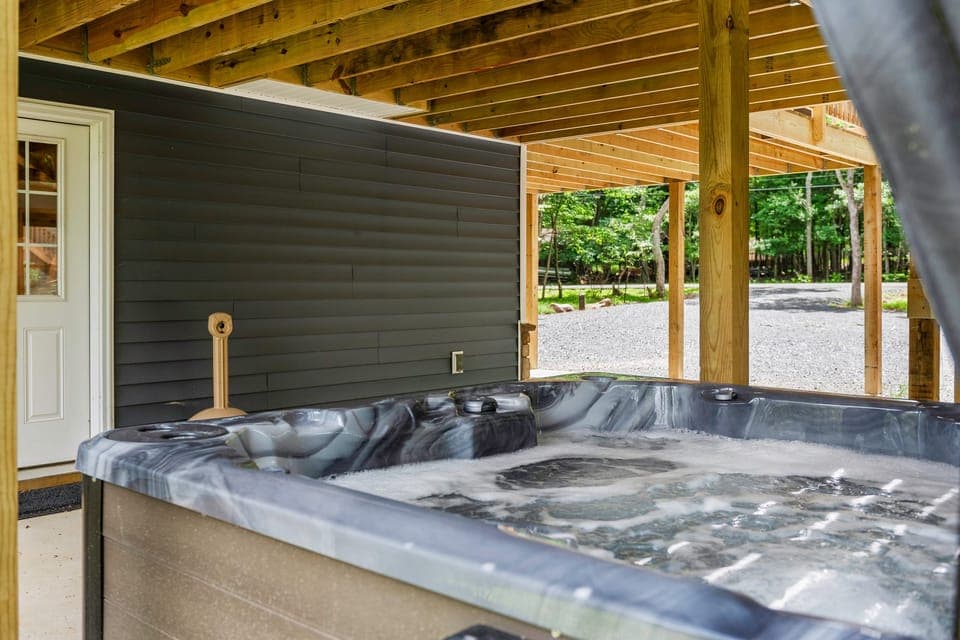 Covered patio &amp; soothing hot tub.