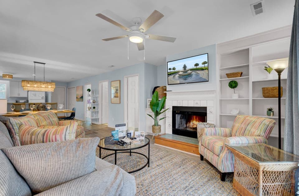 Cozy living room with a fireplace and TV.