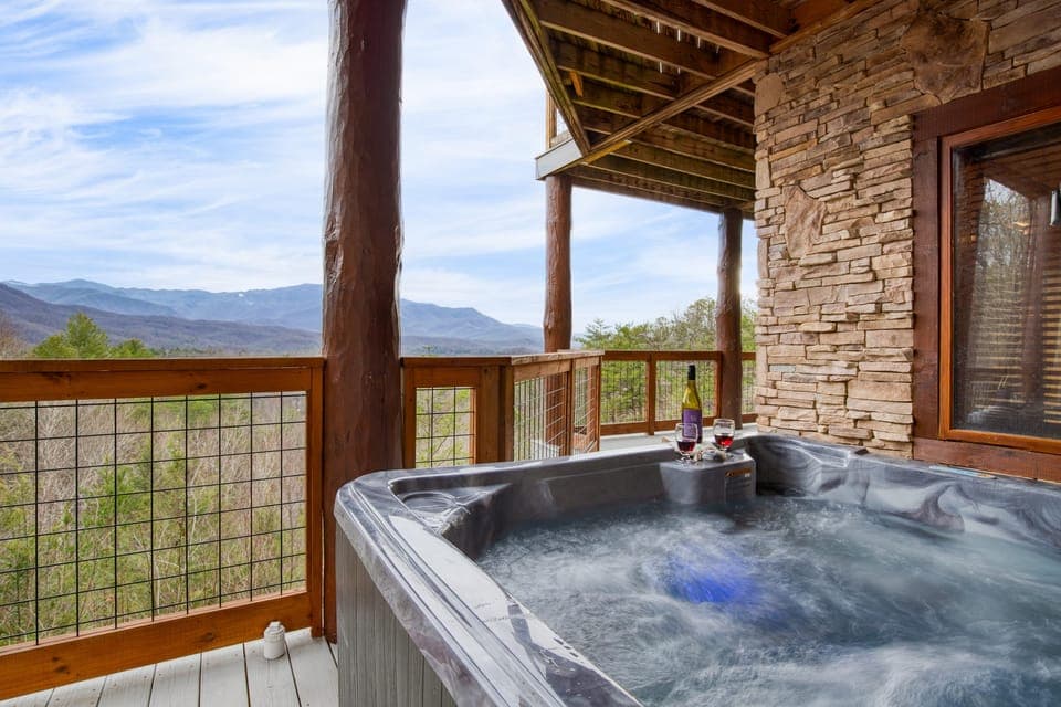 Private hot tub with mountain views.