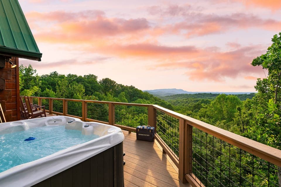 Unwind in the hot tub under the sunset. (Big Bear Lodge)