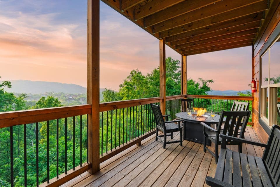 Fire table with seating on the balcony and stunning mountain views. (Evergreen Echo)