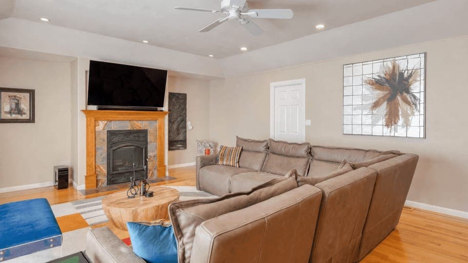 Gather and unwind—spacious living room with plush seating for ultimate comfort.