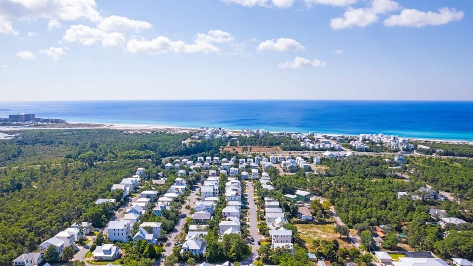 Aerial shot showing proximity to the beach.