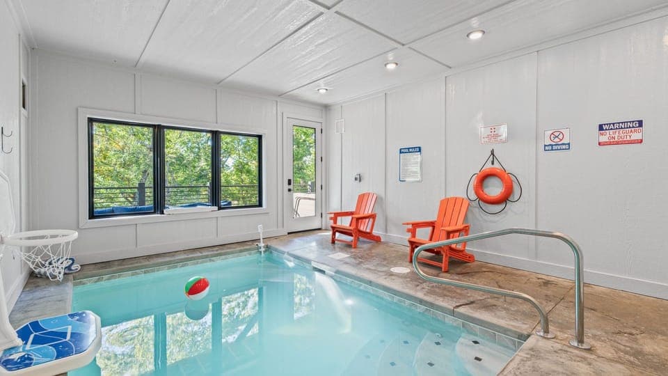 Indoor pool with playful touches and relaxing seating.