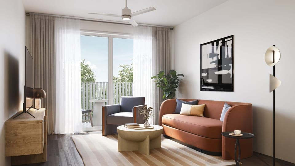 Deluxe 1 Bedroom Suite w/ Balcony: Living room with pull-out couch