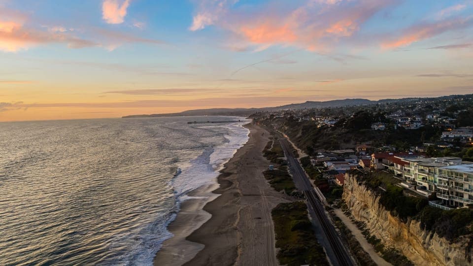 Golden-hour views stretch endlessly along the Pacific coastline.