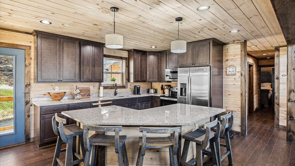 Kitchen featuring a large island and modern appliances.