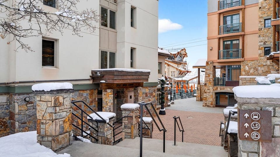 Exterior view of the lodge and surrounding village walkways.