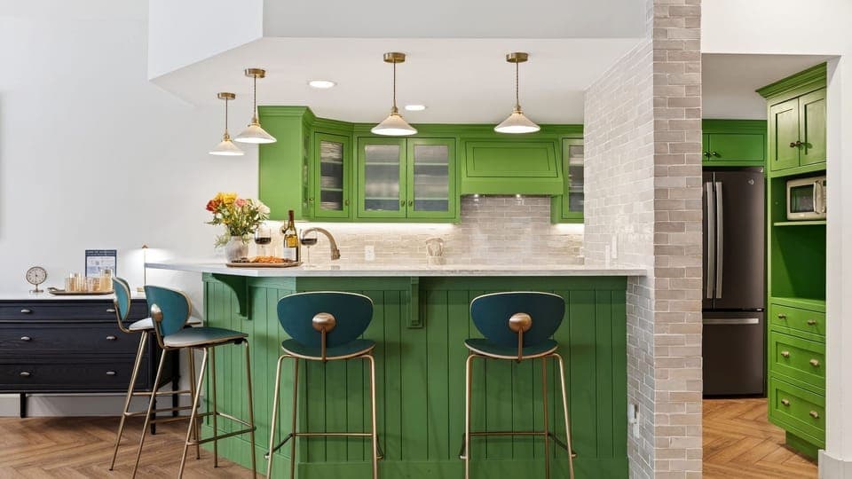 Sunlit dining nook with a cozy banquette and round table—perfect for shared meals, games, and slow mornings.