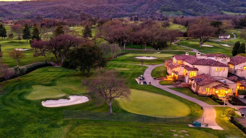 Golden hour across Sonoma’s rolling fairways and vineyard hills — scenic golf views just moments from the property.
