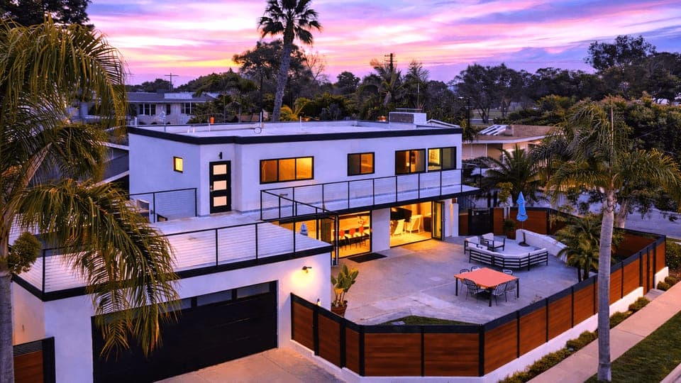 High-angle shot showing the private courtyard and fenced perimeter.