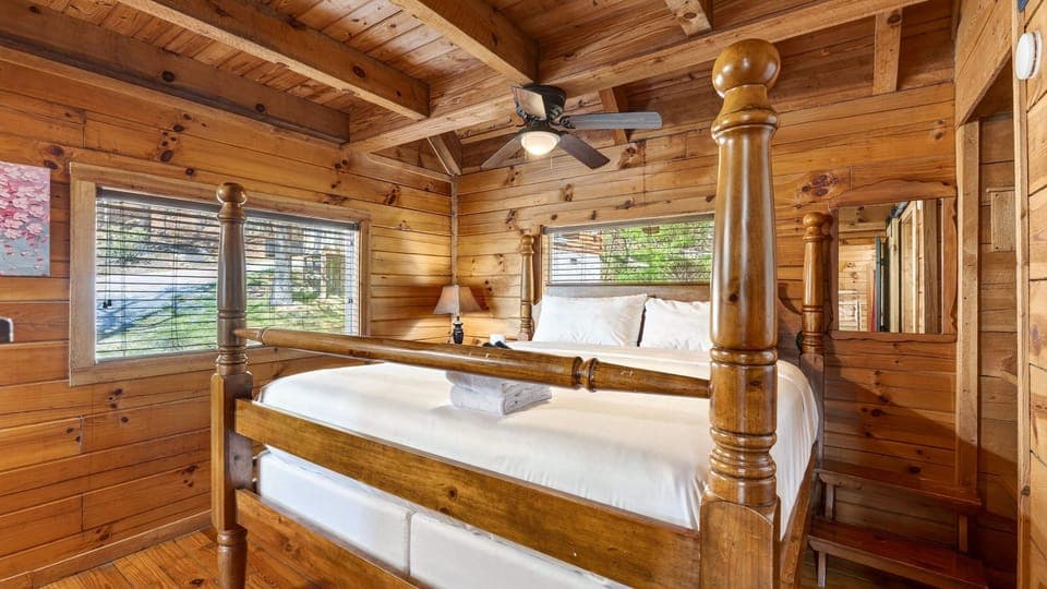 The primary bedroom features a king bed, TV and an ensuite bathroom.