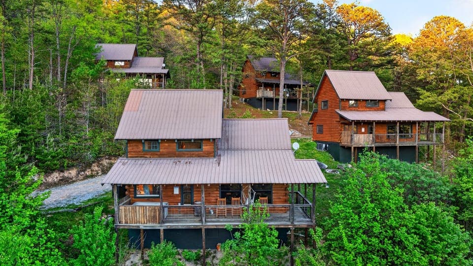 Secluded cabin retreat nestled in the Smoky Mountains, surrounded by lush forest and peaceful mountain scenery.