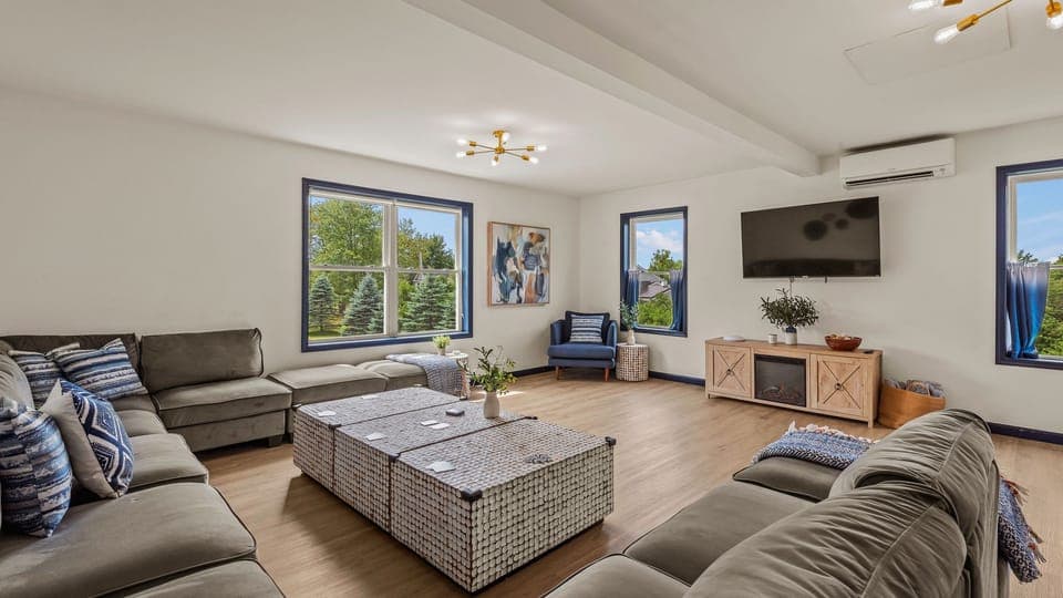 Spacious living area features a large sectional. (For Lake Sake)