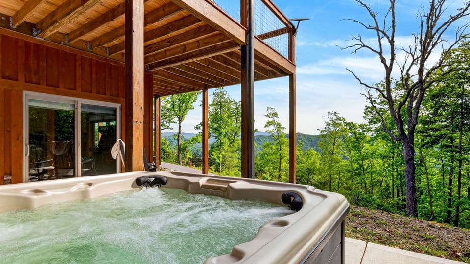 Soak in the mountain air from the private lower-level hot tub.
