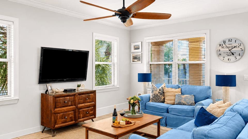 A bright, airy main level featuring plush seating and warm wood accents.
