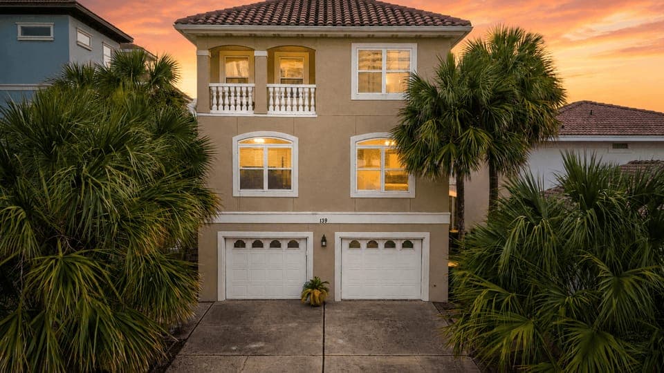 A look at the multi-story home with a spacious two-car garage.