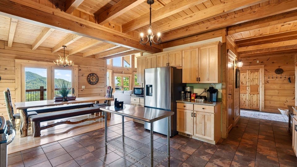 The open-concept kitchen flows seamlessly into the dining area, ideal for group entertaining.