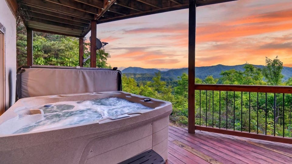 Enjoy breathtaking panoramic views from the warmth of your private deck-side hot tub.