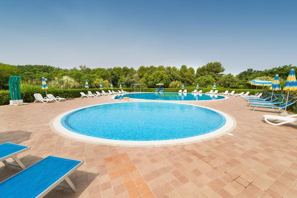 Property building, Living room, Swimming pool