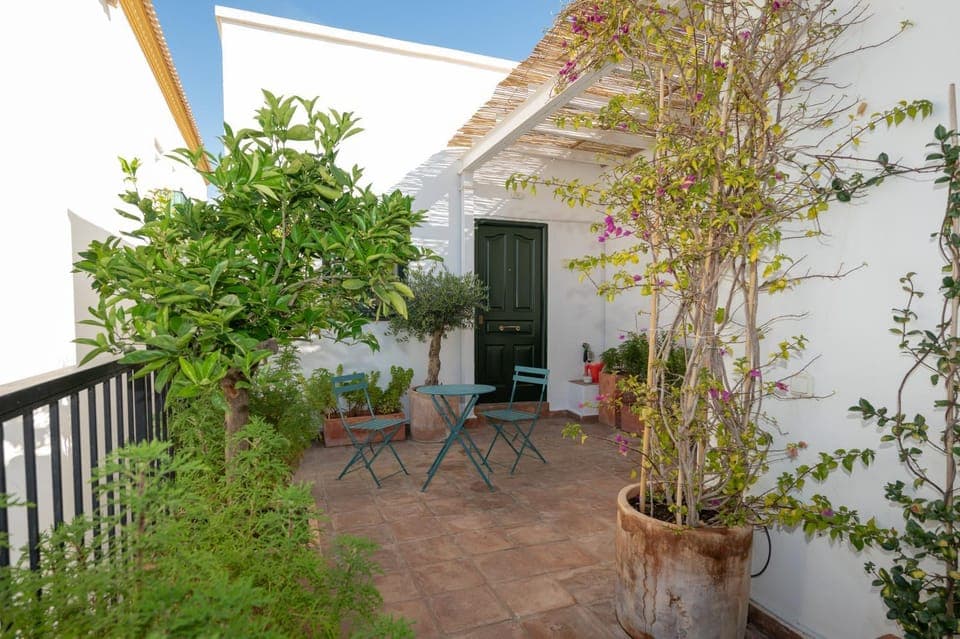 Property building, Patio, Spring, Day, Garden, View (from property/room), Balcony/Terrace, Seating area, Dining area, Garden view