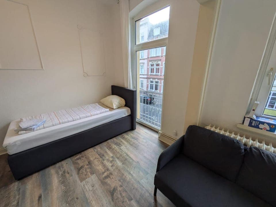 Bed, Seating area, Bedroom