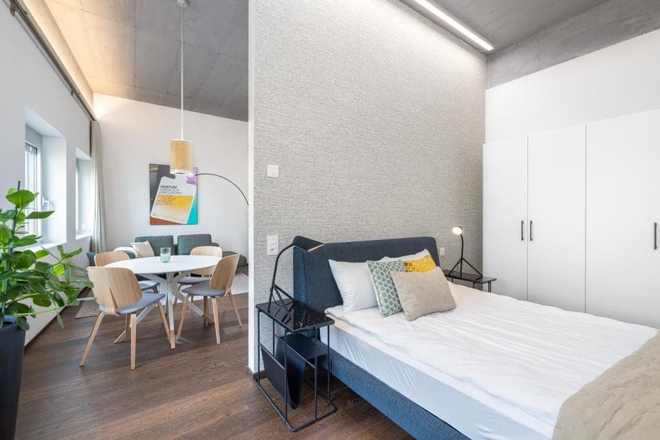 Bed, Living room, Seating area, Bedroom