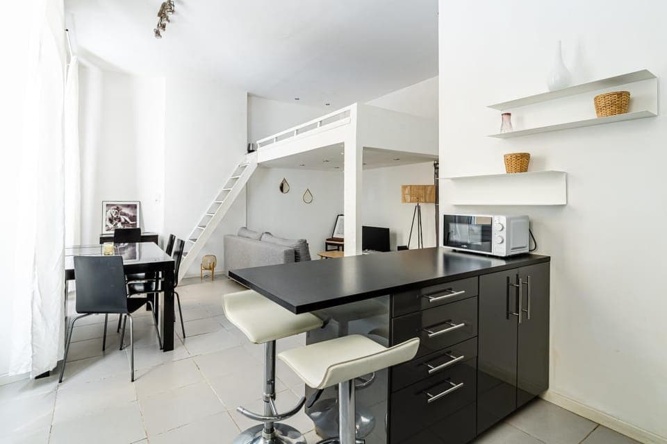 Dining area, minibar, oven, stove