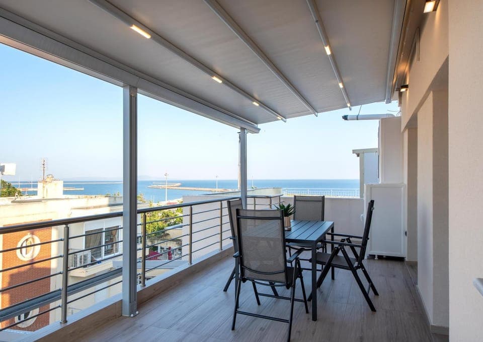 Patio, Day, Natural landscape, View (from property/room), Living room, Seating area, Dining area, Sea view