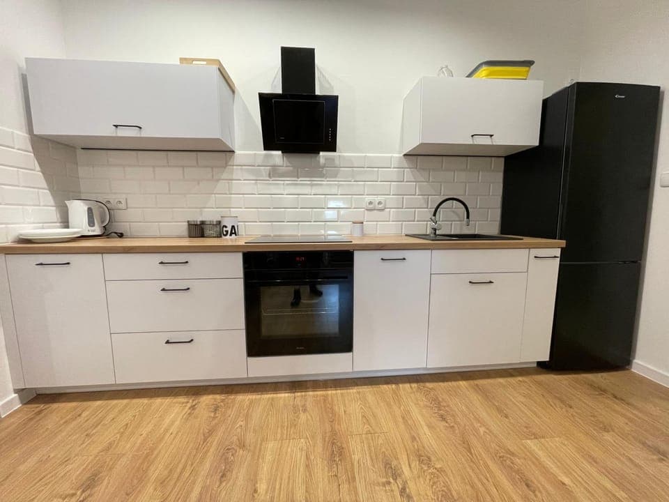 Kitchen or kitchenette, oven, stove