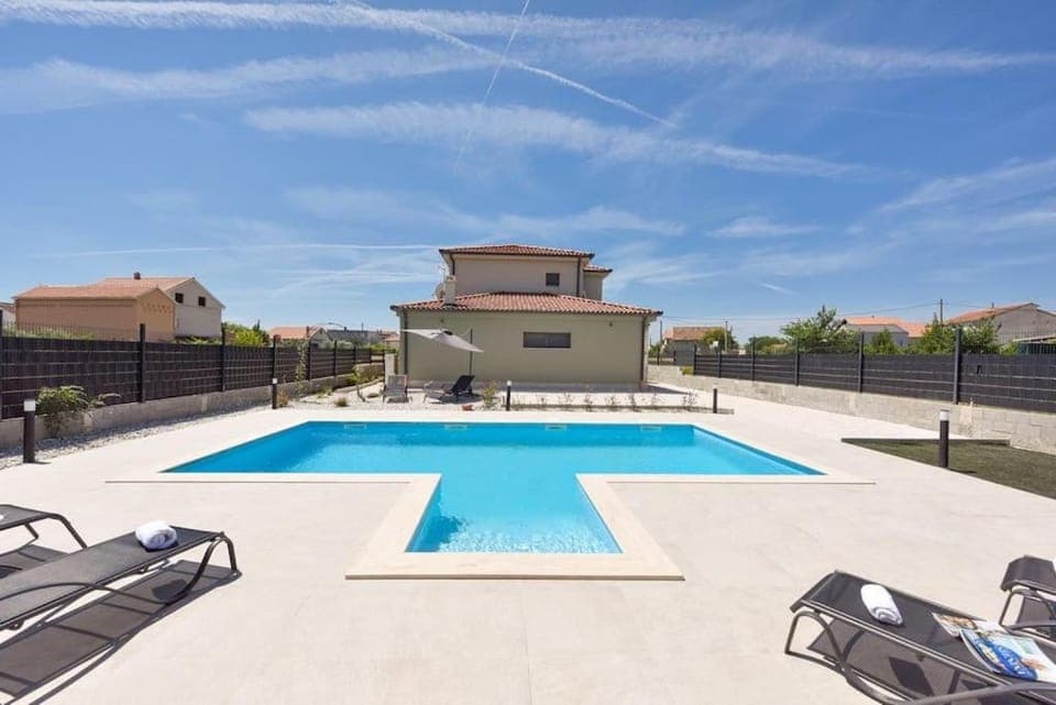 Patio, Day, Pool view, Swimming pool, sunbed