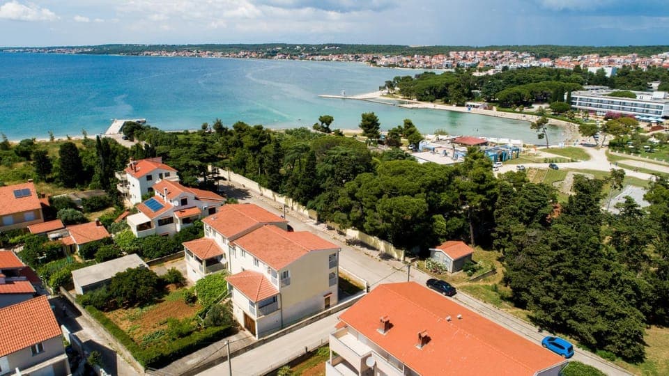 Property building, Nearby landmark, Neighbourhood, Natural landscape, Bird's eye view, Beach, Street view
