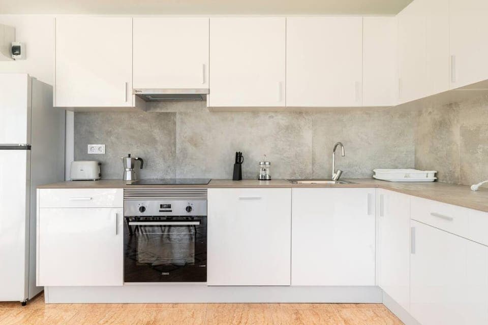 Kitchen or kitchenette, oven, stove, toaster
