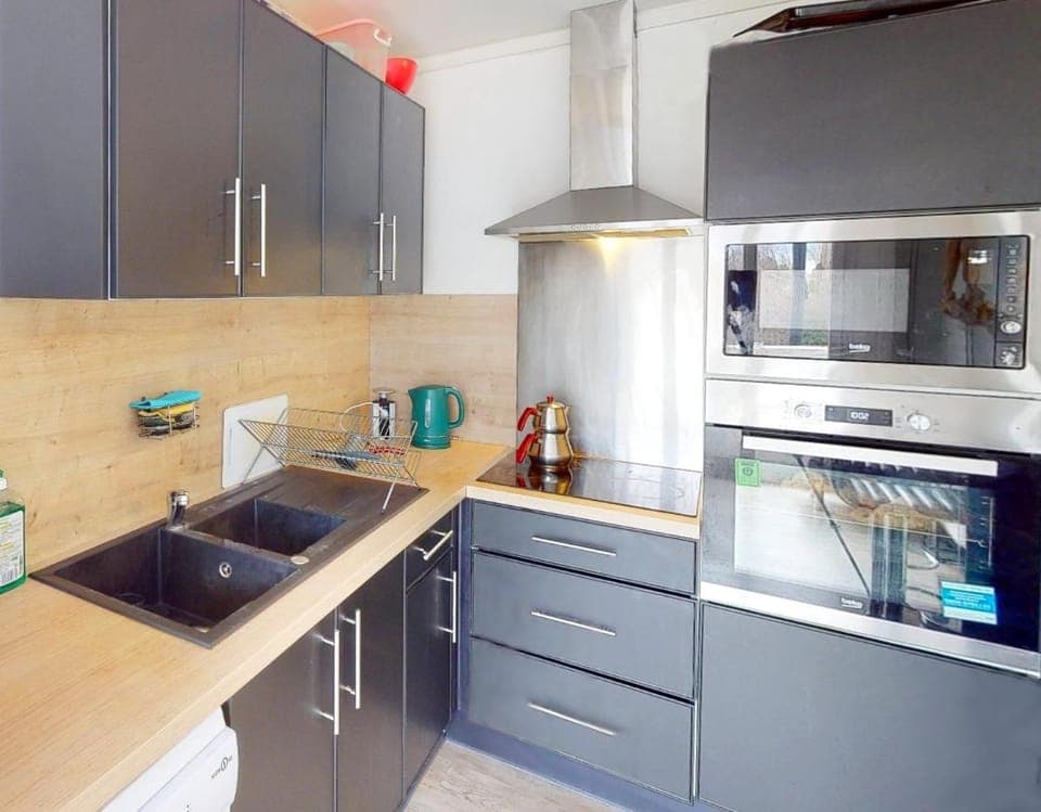 Kitchen or kitchenette, oven, stove