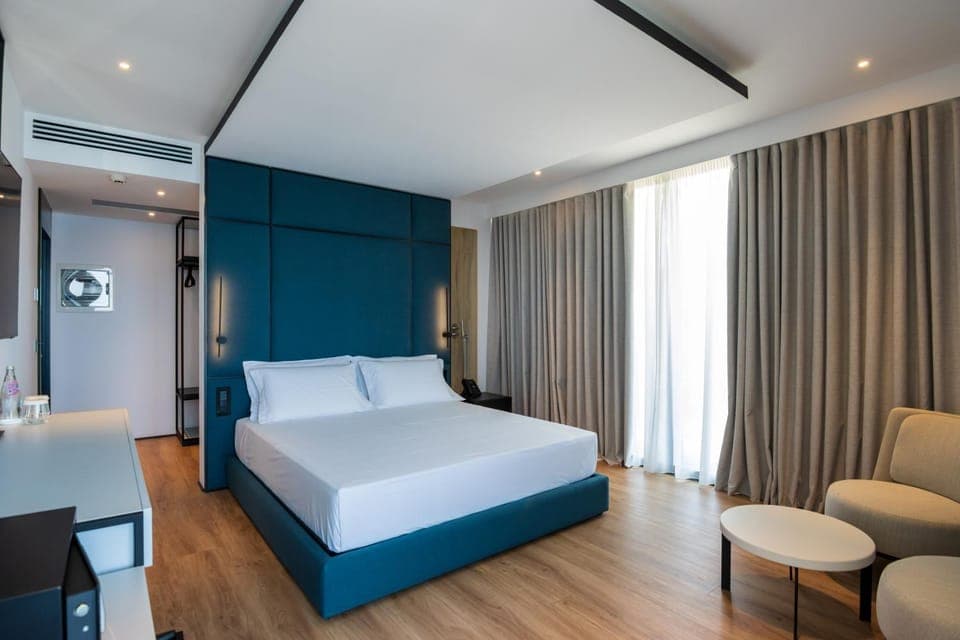 Bed, Living room, Seating area, Bedroom