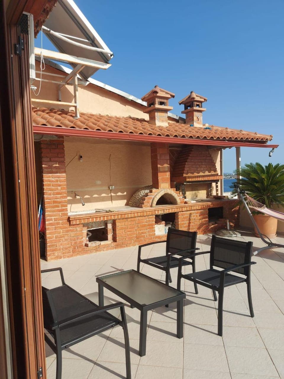 Property building, BBQ facilities, View (from property/room), Balcony/Terrace, Seating area