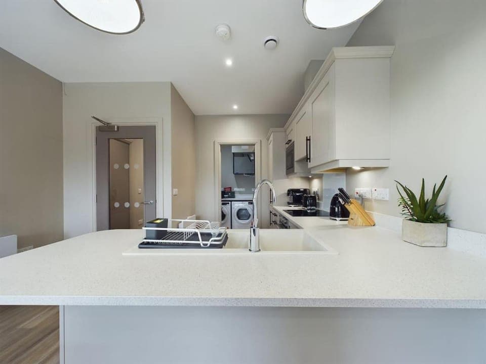 Kitchen or kitchenette, stove, toaster