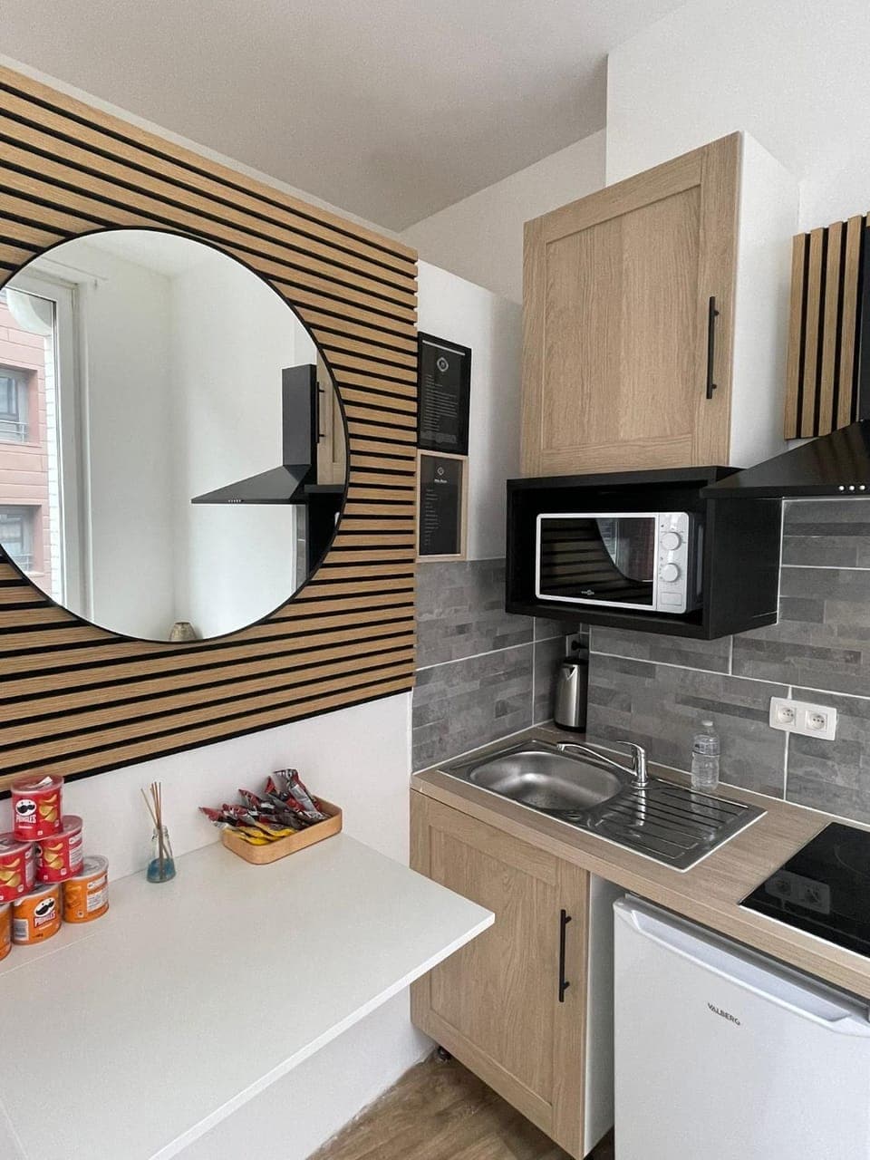 Kitchen or kitchenette, microwave, stove, kitchen