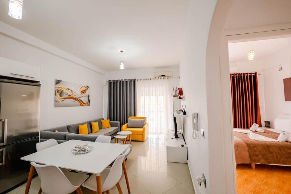 Bed, TV and multimedia, Seating area, Bedroom, air conditioner