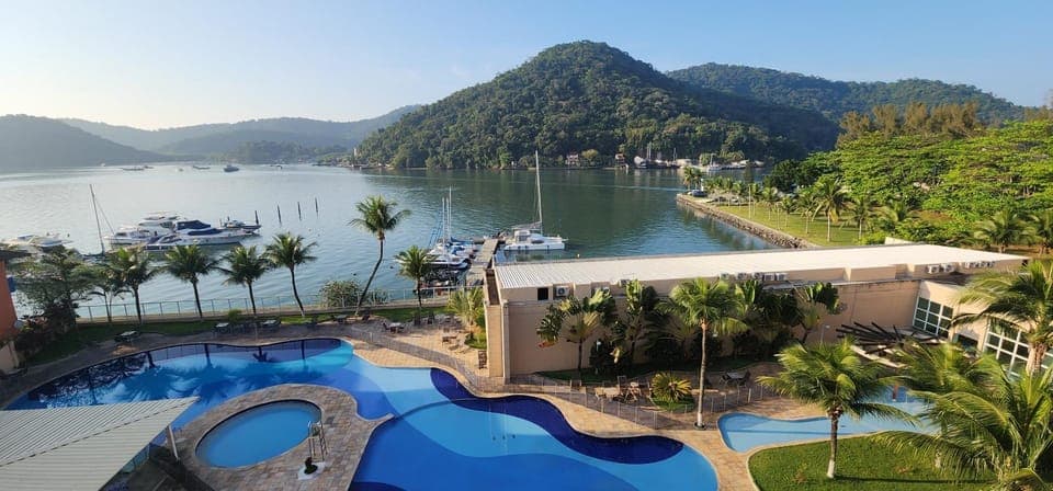 Property building, Nearby landmark, Day, Natural landscape, Pool view, Swimming pool