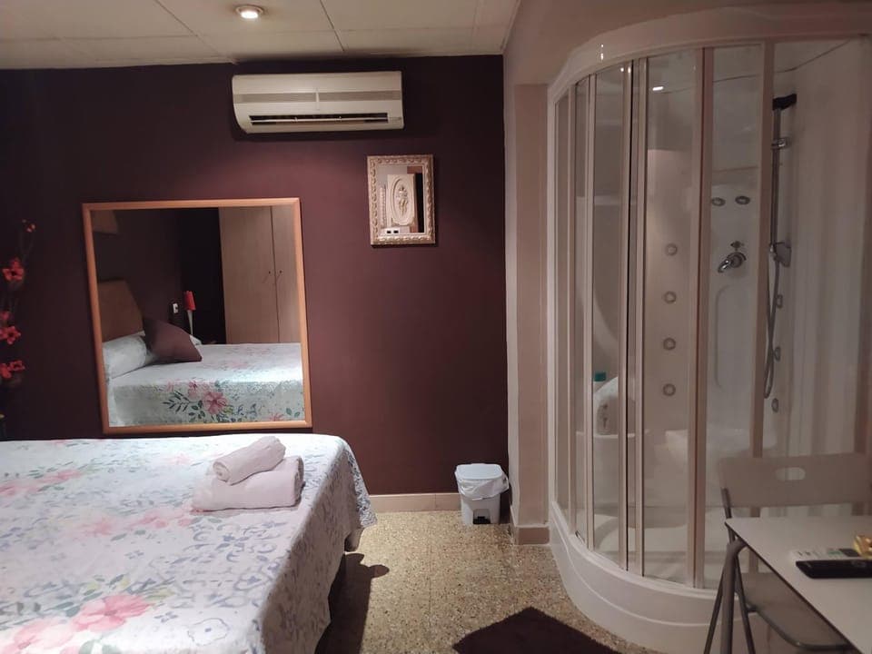 Shower, Bed, Photo of the whole room, towels, air conditioner