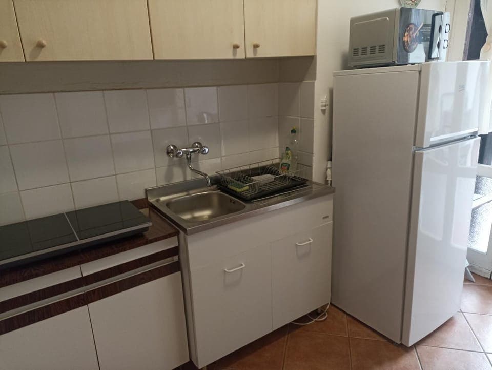 Kitchen or kitchenette, stove