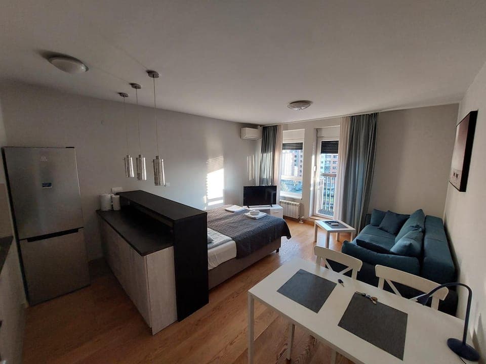 Bed, TV and multimedia, Kitchen or kitchenette, Living room, Photo of the whole room, Seating area, wardrobe