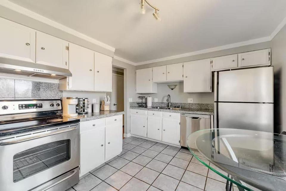 Kitchen or kitchenette, dishwasher, oven, stove, toaster